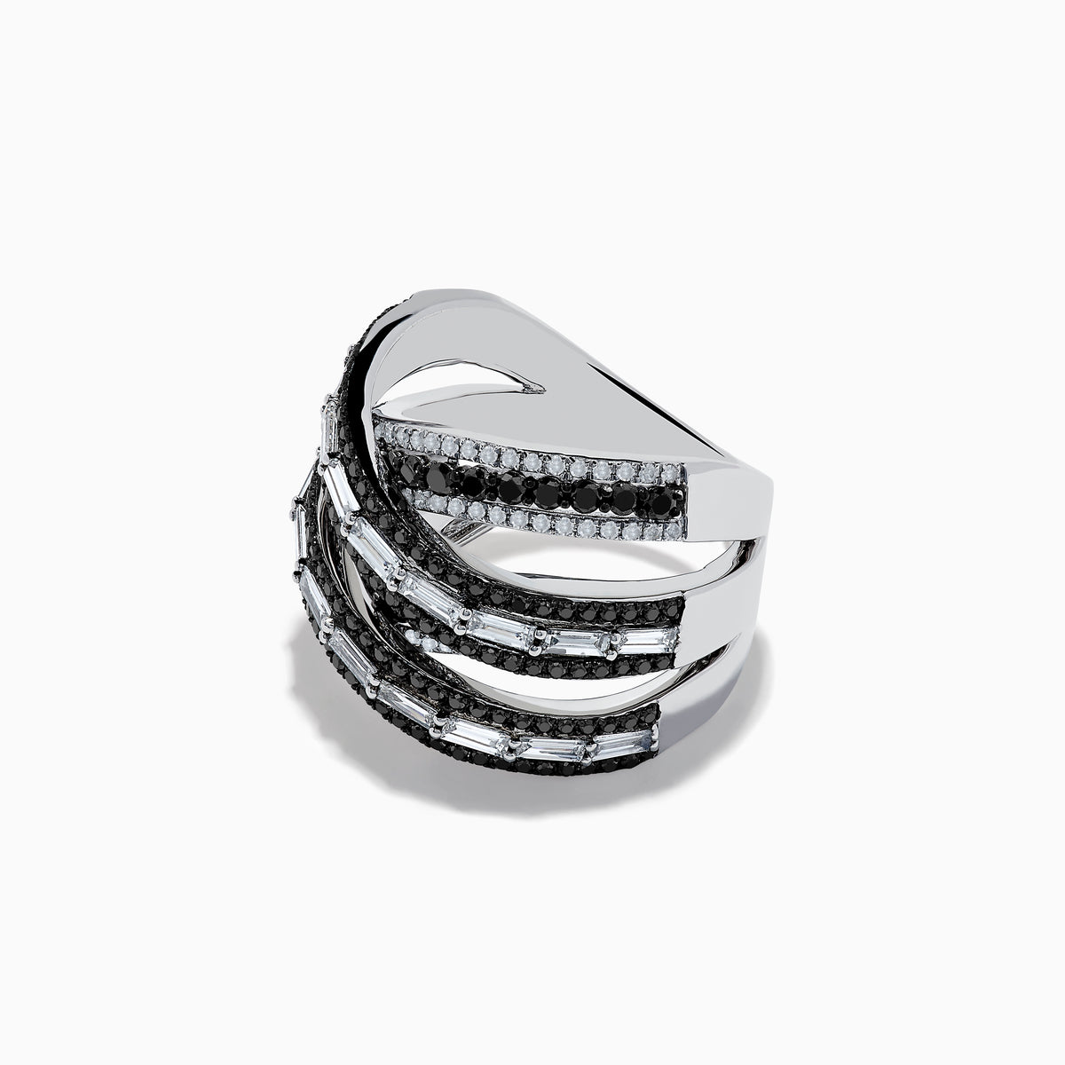 The 14K White Gold Black and White Diamond Criss Cross Ring features overlapping bands set with alternating rows of black and white diamonds for a striking, modern look.