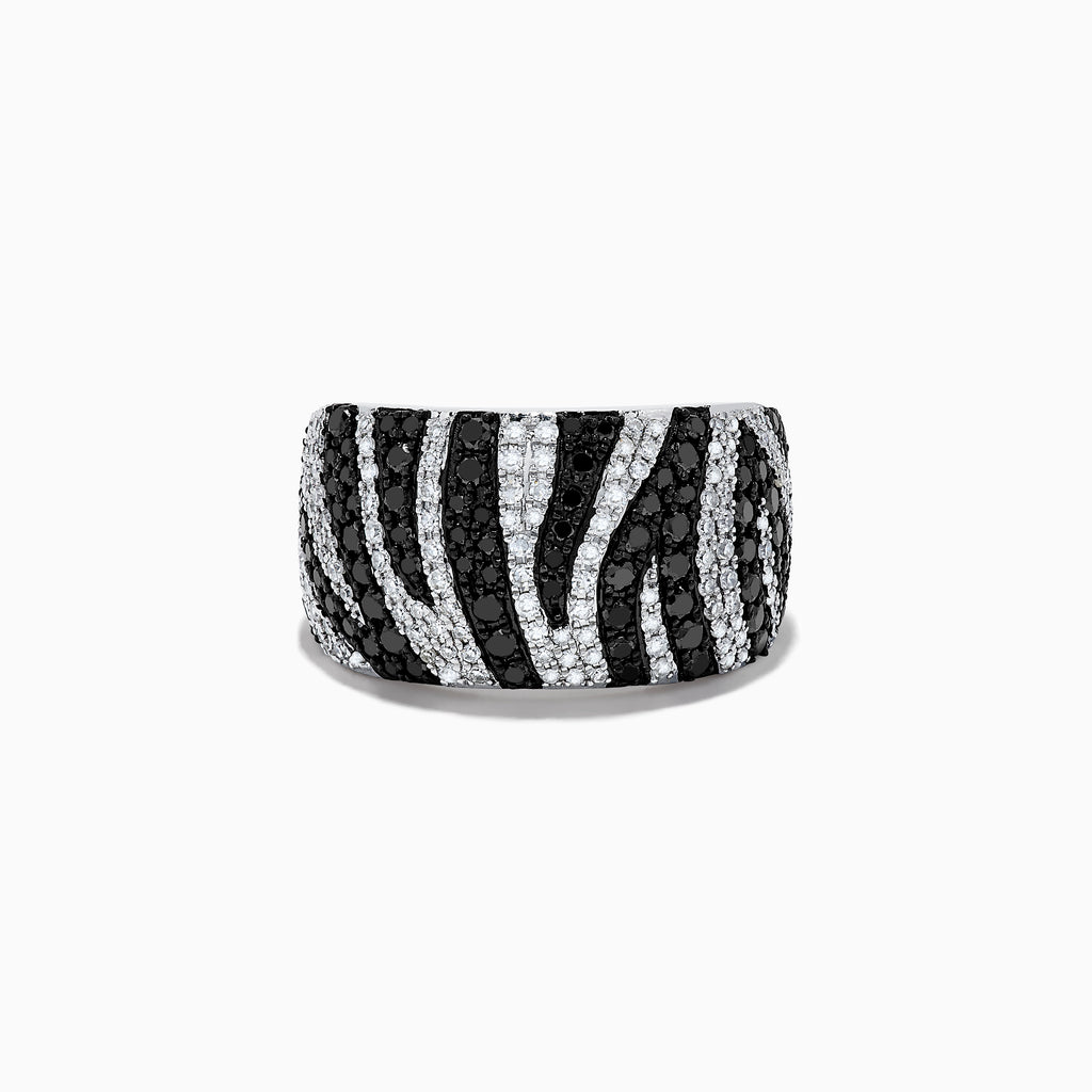 The 14k White Gold Black and White Diamond Zebra Print Ring features alternating rows of black and white diamonds in a bold zebra pattern, set in a polished white gold band against a plain white background.