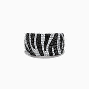 The 14k White Gold Black and White Diamond Zebra Print Ring features alternating rows of black and white diamonds in a bold zebra pattern, set in a polished white gold band against a plain white background.
