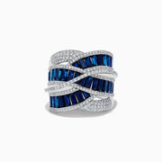 The Royale Bleu 14K White Gold Blue Sapphire and Diamond Crossover Ring showcases three rows of rectangular blue sapphires interlaced with curved diamond-studded bands, all set in elegant white gold.