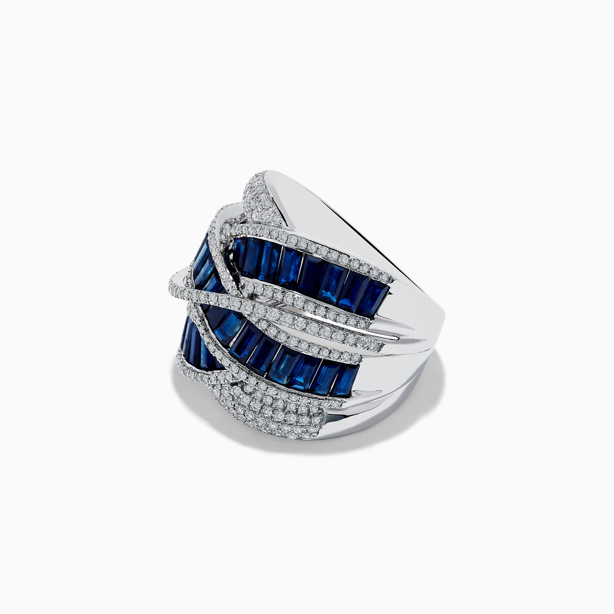 The Royale Bleu 14K White Gold Blue Sapphire and Diamond Crossover Ring showcases three rows of rectangular blue sapphires interlaced with curved diamond-studded bands, all set in elegant white gold.