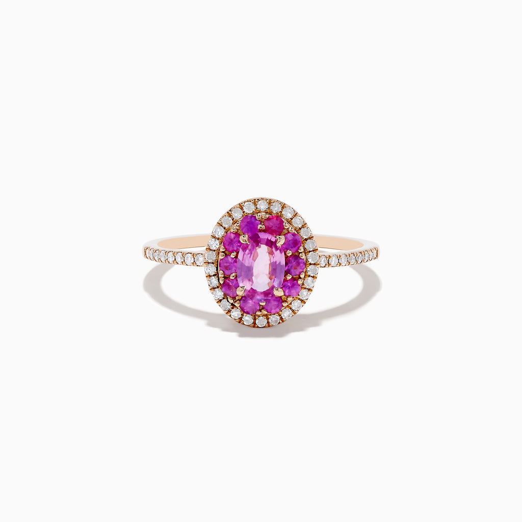 The 14K Rose Gold Pink Sapphire and Diamond Double Halo Ring features an oval pink sapphire center, double halo of clear diamonds, and a slim band with additional diamonds, shown on a white background.