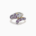 The Signature 14K Yellow Gold Pink Sapphire and Diamond Panther Ring features a graceful panther design with pink sapphires, diamonds, and emerald-green eyes, the band elegantly curving into the panther’s head and tail.