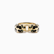 The Signature 14K Yellow Gold Diamond and Natural Emerald Ring features two panther heads with black and green enamel details, facing each other and joined at the center by a diamond-studded link.