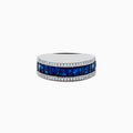 The Royale Bleu 14K White Gold Blue Sapphire and Diamond Ring showcases a central row of rectangular blue sapphires bordered by rows of sparkling diamonds, set against a white background.