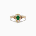 The Brasilica 14K Yellow Gold Emerald, White and Espresso Diamond Ring features a pear-shaped emerald center, two rows of sparkling diamonds, and additional diamonds adorning the band.