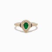 The Brasilica 14K Yellow Gold Emerald, White and Espresso Diamond Ring features a pear-shaped emerald center, two rows of sparkling diamonds, and additional diamonds adorning the band.