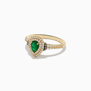 The Brasilica 14K Yellow Gold Emerald, White and Espresso Diamond Ring features a pear-shaped emerald center, two rows of sparkling diamonds, and additional diamonds adorning the band.