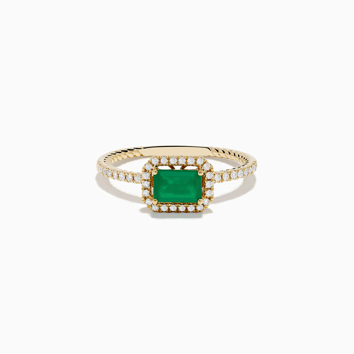 The 14K Yellow Gold Emerald and Diamond Ring features a square-cut emerald center, a halo of white diamonds, and a twisted band design.