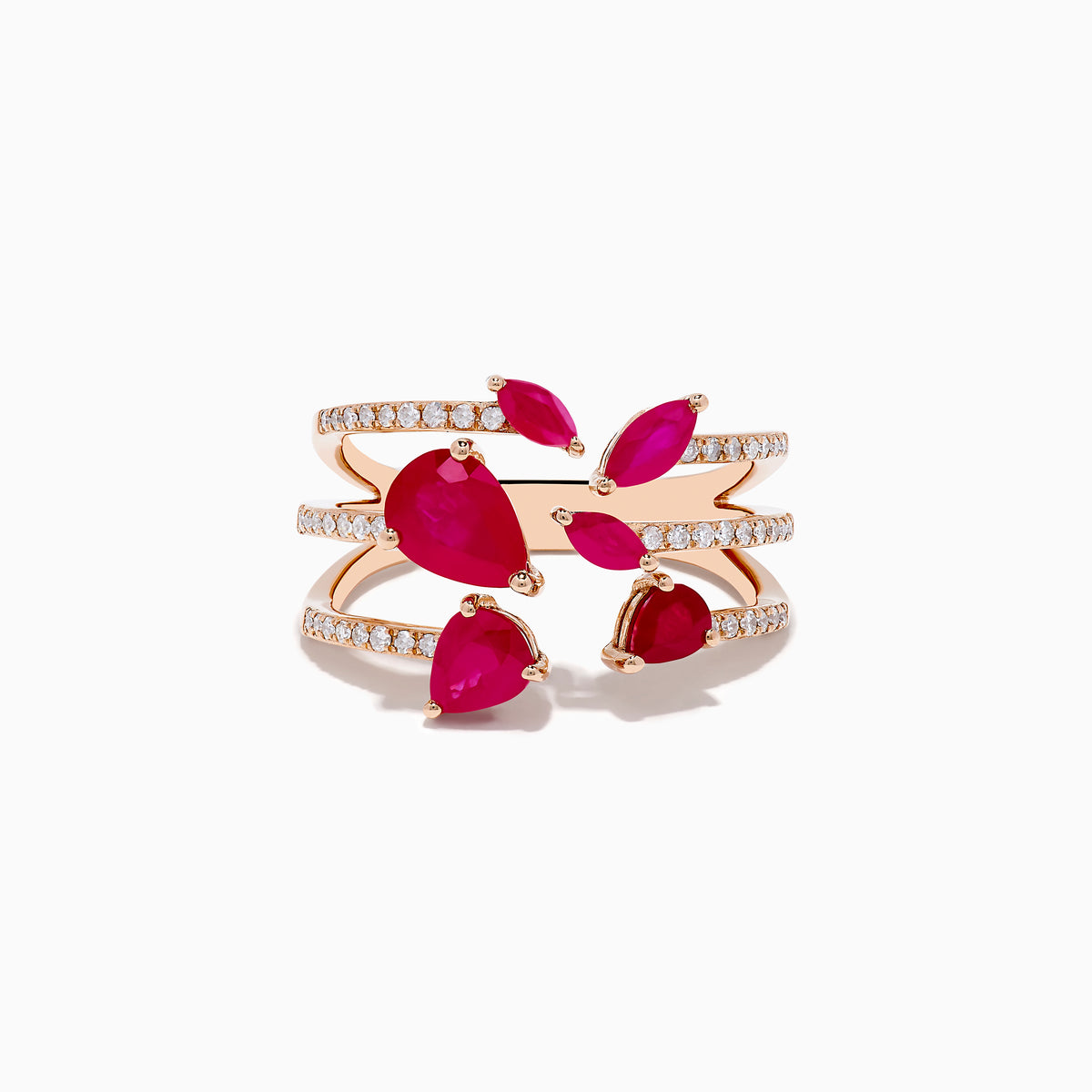 The Ruby Royale 14K Rose Gold Ruby and Diamond Ring features multiple bands with sparkling diamonds and vivid red rubies in teardrop and marquise cuts, set against a white background.