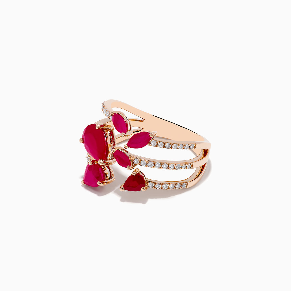 The Ruby Royale 14K Rose Gold Ruby and Diamond Ring features multiple bands with sparkling diamonds and vivid red rubies in teardrop and marquise cuts, set against a white background.
