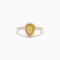 The Canare 14K Yellow Gold White and Yellow Diamond Ring features a pear-shaped yellow diamond with a white diamond halo and diamond-accented band, shown on a white background.