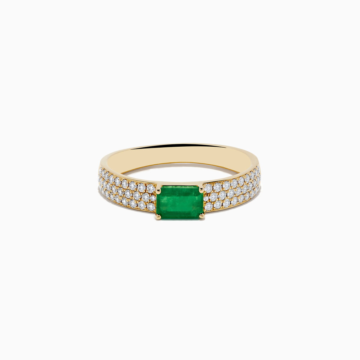 A 14K Yellow Gold Emerald and Diamond Ring featuring a rectangular emerald center with pavé-set diamonds along both sides of the band, displayed on a white background.
