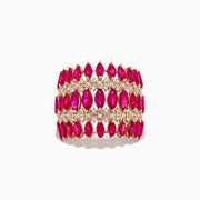 The Ruby Royale 14K Rose Gold Ruby and Diamond Ring showcases four rows of marquise-cut pink rubies alternating with sparkling white diamonds, creating an intricate, elegant pattern.