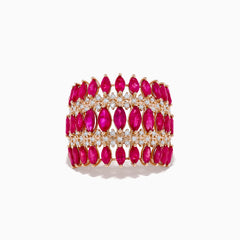 The Ruby Royale 14K Rose Gold Ruby and Diamond Ring showcases four rows of marquise-cut pink rubies alternating with sparkling white diamonds, creating an intricate, elegant pattern.