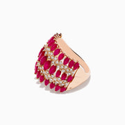 The Ruby Royale 14K Rose Gold Ruby and Diamond Ring showcases four rows of marquise-cut pink rubies alternating with sparkling white diamonds, creating an intricate, elegant pattern.