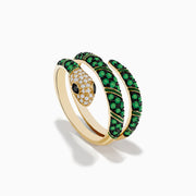 The Brasilica 14K Yellow Gold Emerald and Diamond Wrap Snake Ring features a spiral-coiled design, encrusted with emerald-green gemstones, sparkling diamonds on the head, and a striking black stone eye.