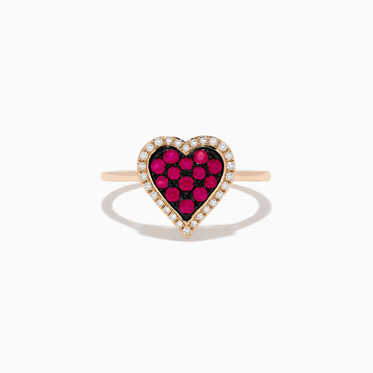 The Novelty 14K Rose Gold Ruby and Diamond Heart Ring features a heart-shaped centerpiece with red rubies surrounded by small clear diamonds, shown against a plain white background.