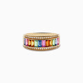 The Watercolors 14K Yellow Gold Multi Sapphire and Diamond Ring showcases vibrant sapphires in various hues bordered by two rows of sparkling diamonds, all set on a yellow gold band and displayed against a white background.