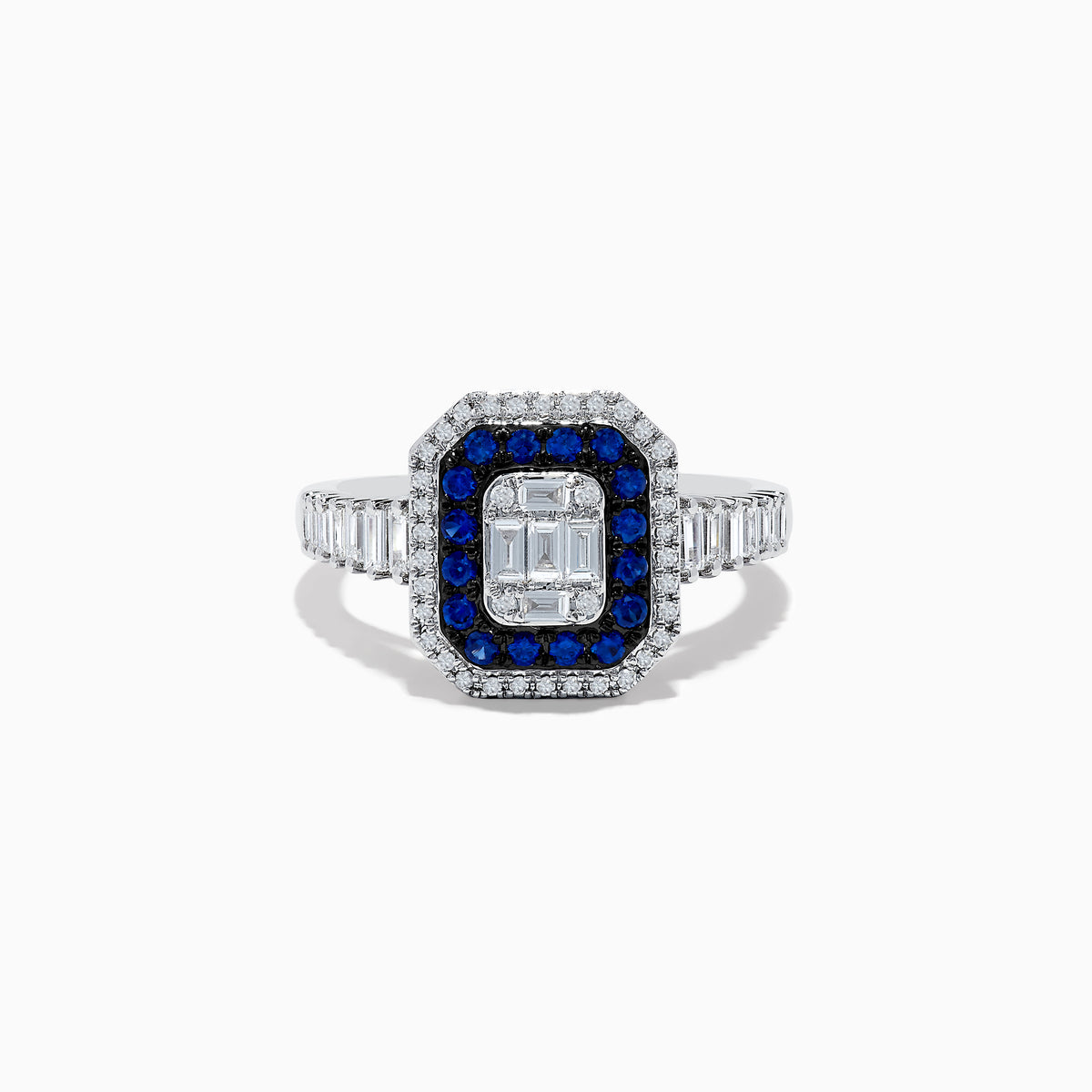 The Royale Bleu 14K White Gold Blue Sapphire and Diamond Ring showcases a rectangular center diamond, encircled by a blue sapphire halo, a second white diamond halo, and baguette-cut diamonds on the band.