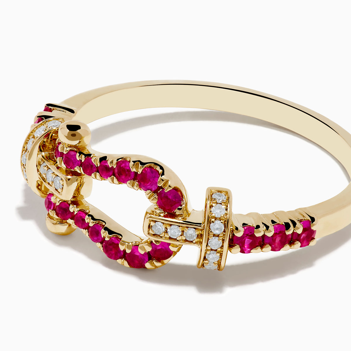The 14K Yellow Gold Ruby and Diamond Horseshoe Ring showcases a central horseshoe motif with sparkling rubies and diamond accents, offering an elegant and colorful look.