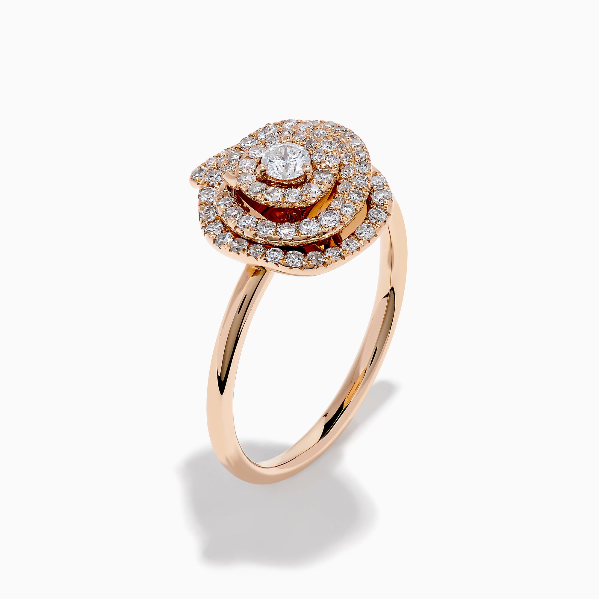 The Pave Rose 14K Rose Gold Diamond Rose Ring showcases a central round diamond encircled by concentric pave-set diamonds, creating an elegant spiral floral design.