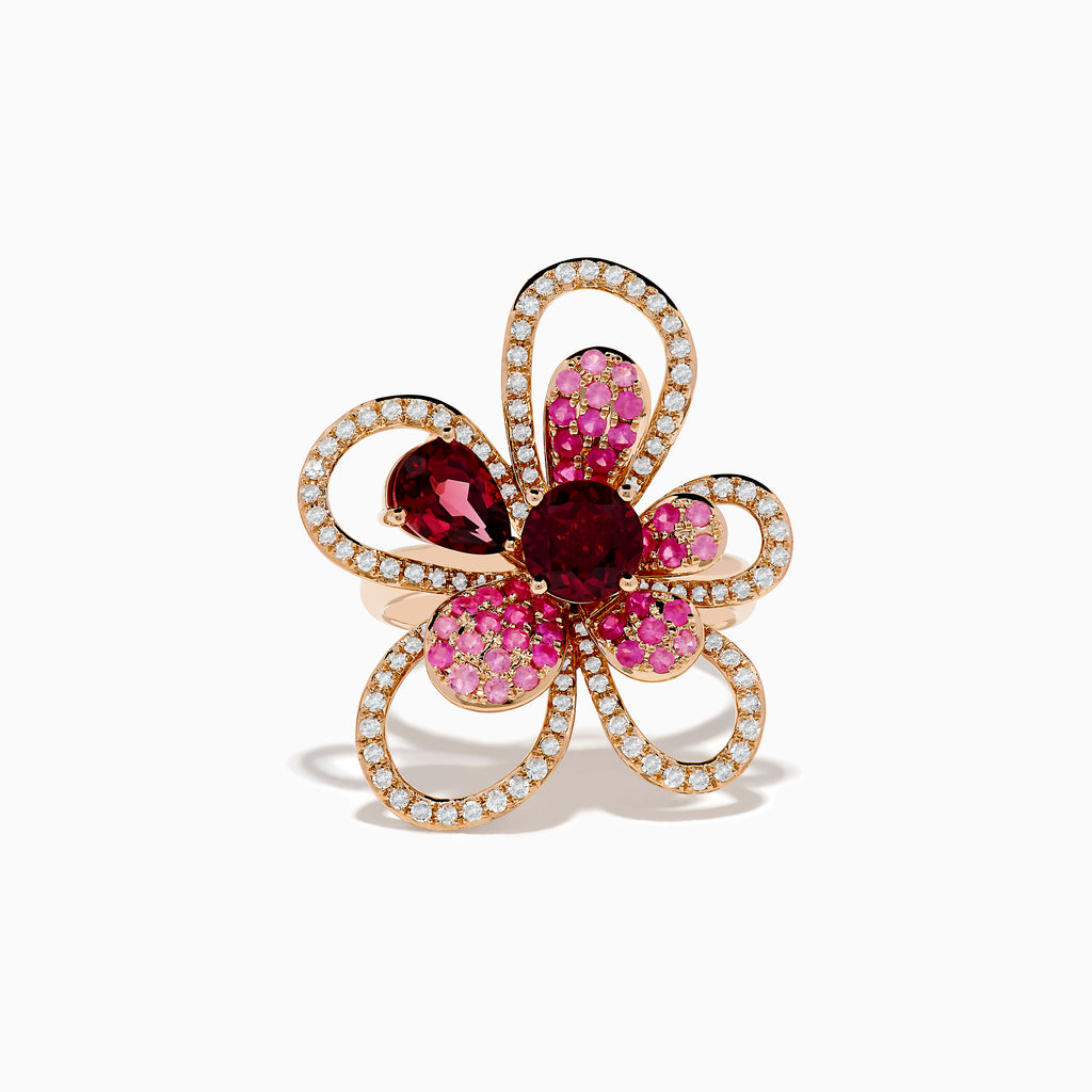 The Nature 14K Rose Gold Pink Sapphire Rhodolite and Diamond Ring features a large, stylized flower design with diamond-outlined loops, pink sapphires and red gemstones on the petals, and two deep red stones at its center.