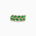 The 14K White Gold Emerald and Diamond Marquise Leaf Ring features a leaf-inspired design adorned with marquise emeralds and sparkling diamond accents.