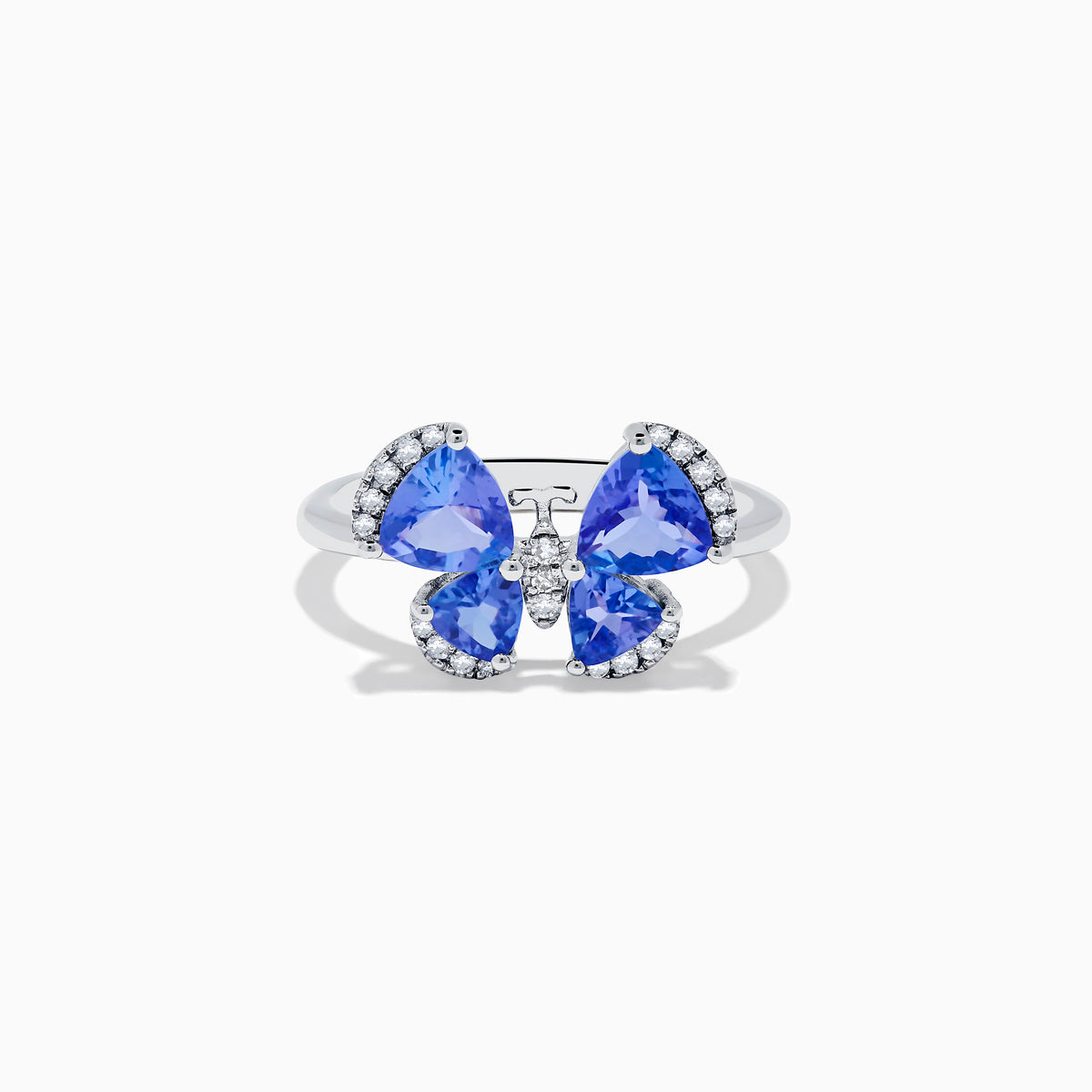 The Nahla Siri 14K White Gold Tanzanite and Diamond Butterfly Ring features four tanzanite blue wings with sparkling diamond outlines, set against a white background.