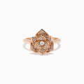 The Pave Rose 14K Rose Gold Diamond Rose Ring features a detailed floral design with multiple small diamonds forming the petals and center, all set against a white background.