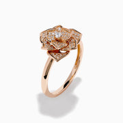 The Pave Rose 14K Rose Gold Diamond Rose Ring features a detailed floral design with multiple small diamonds forming the petals and center, all set against a white background.