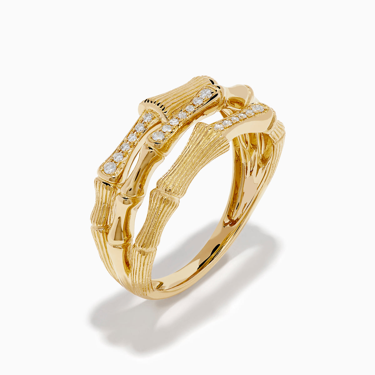 The 14K Yellow Gold Diamond Bamboo Multi Row Ring features two bamboo-inspired bands set with central rows of white diamonds, stacked together for a striking modern twist on the classic diamond ring.