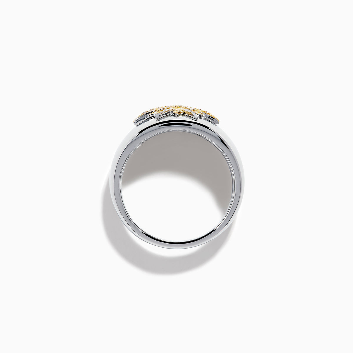 The Sterling Silver and 14K Yellow Gold Plated Diamond Star Ring features a sparkling starburst design with diamonds at the center, creating an elegant and charming look against a plain white background.