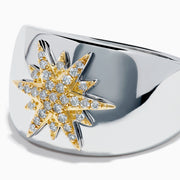 The Sterling Silver and 14K Yellow Gold Plated Diamond Star Ring features a sparkling starburst design with diamonds at the center, creating an elegant and charming look against a plain white background.