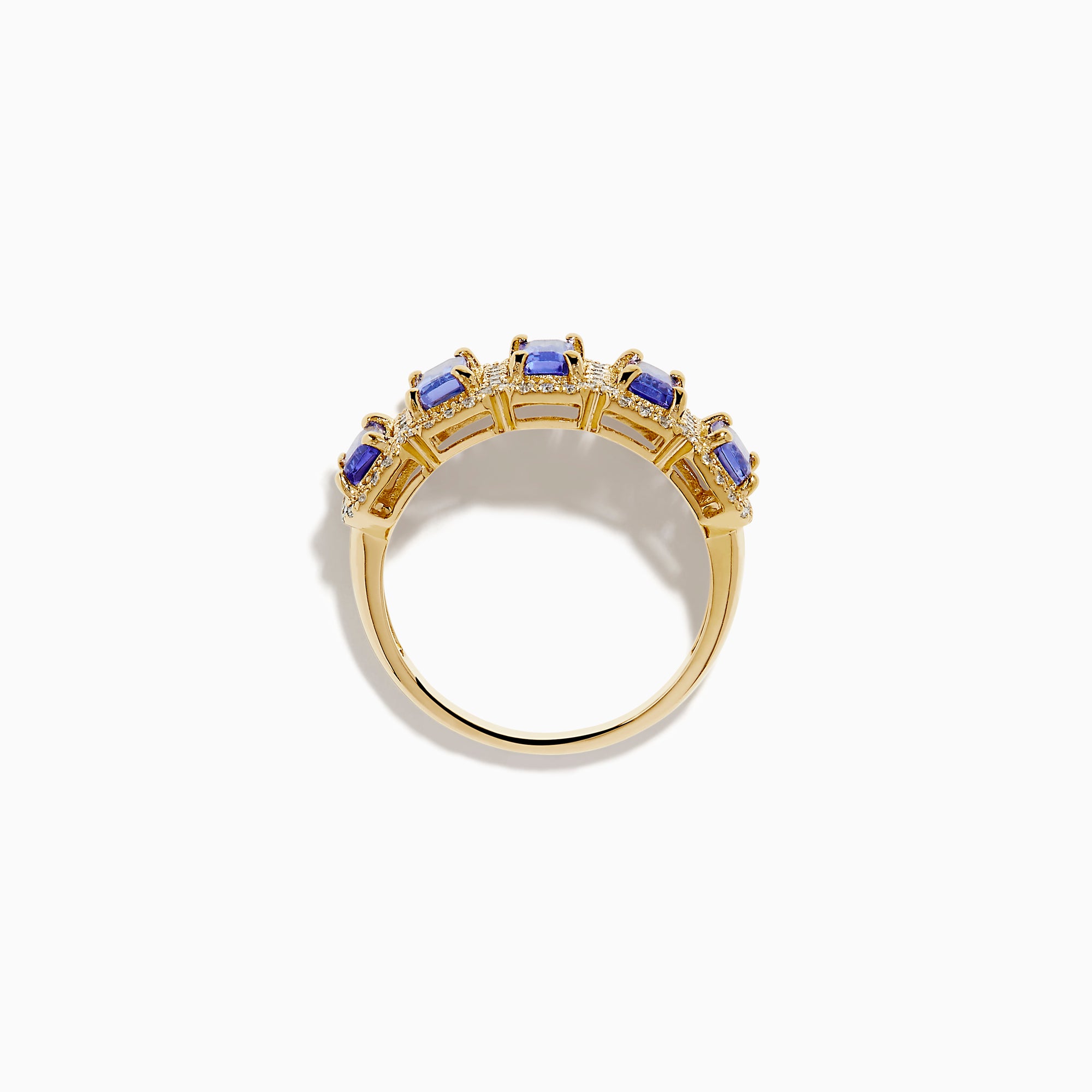 The 14K Yellow Gold Tanzanite and Diamond Halo Band showcases five rectangular tanzanites, each framed by a sparkling diamond halo, creating an elegant continuous design.