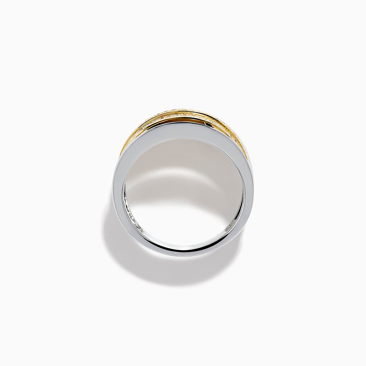 The Sterling Silver and 14K Yellow Gold Plated Diamond Statement Ring features a wide, polished band with three parallel gold-plated bands set with sparkling white stones for a modern, elegant look.