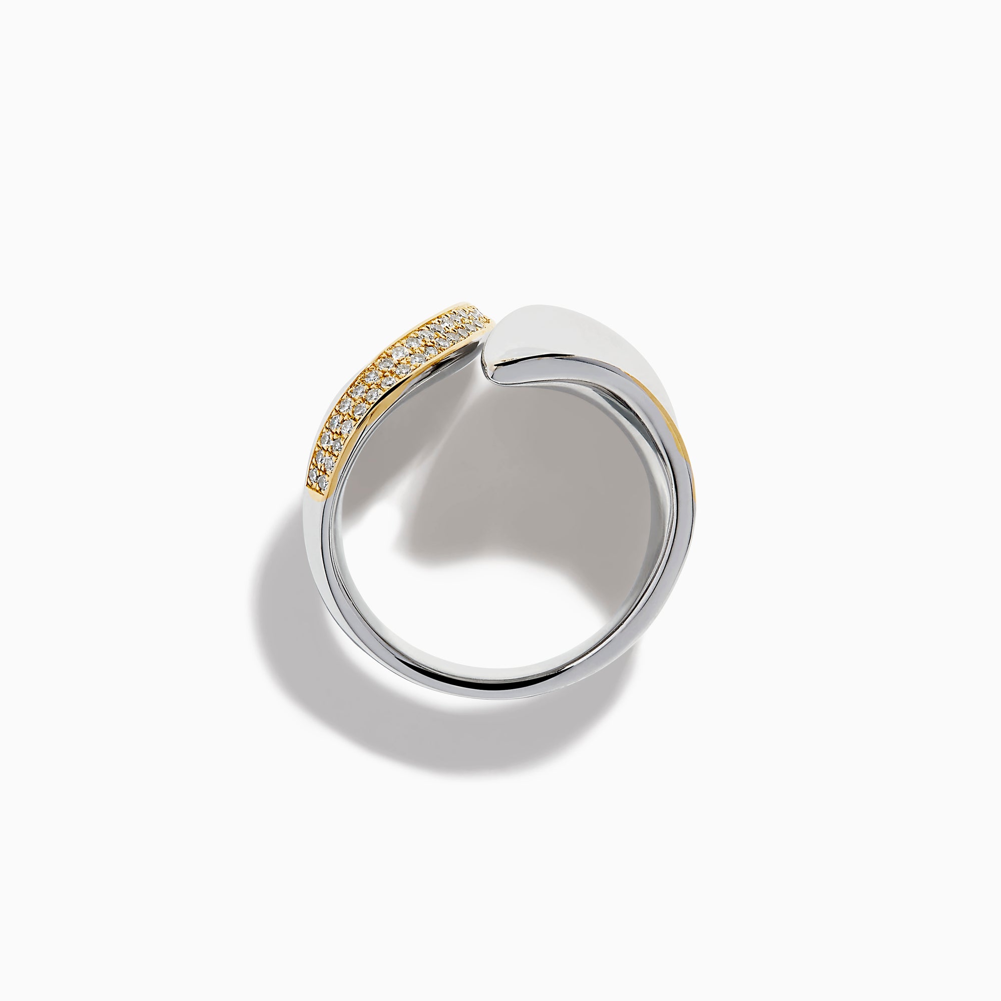 The 925 Sterling Silver & 14K Yellow Gold Plating Modern Sculptural Diamond Ring features overlapping asymmetrical silver shapes edged in gold plating and accented with small diamonds, shown on a white background.