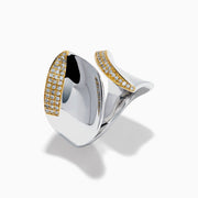 The 925 Sterling Silver & 14K Yellow Gold Plating Modern Sculptural Diamond Ring features overlapping asymmetrical silver shapes edged in gold plating and accented with small diamonds, shown on a white background.