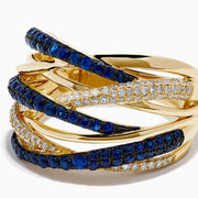 The 14K Yellow Gold Sapphire and Diamond Crossover Ring features multiple overlapping bands with alternating rows of sapphires and diamonds, creating a layered, intricate look.