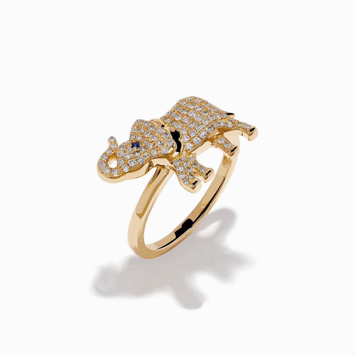 The Safari 14K Yellow Gold Sapphire and Diamond Elephant Ring features an elephant design set with sparkling diamonds and a sapphire blue gemstone eye, all crafted in 14K yellow gold.