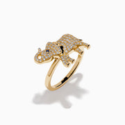 The Safari 14K Yellow Gold Sapphire and Diamond Elephant Ring features an elephant design set with sparkling diamonds and a sapphire blue gemstone eye, all crafted in 14K yellow gold.