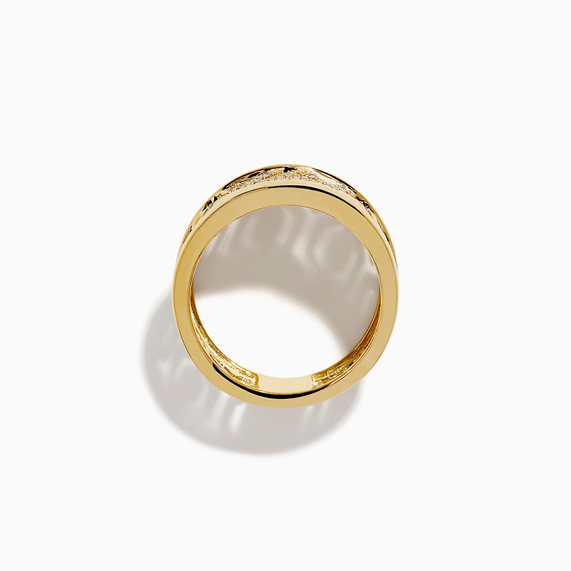 The D'Oro 14K Yellow Gold Geometric Diamond Ring features a wide band with intricate geometric patterns set with sparkling white diamonds, offering an ornate and luxurious look.