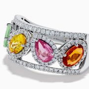 The Watercolors 14K White Gold Multi Sapphire and Diamond Band showcases five large, oval sapphires in green, yellow, pink, orange, and red, each encircled by diamonds on a striking double band.