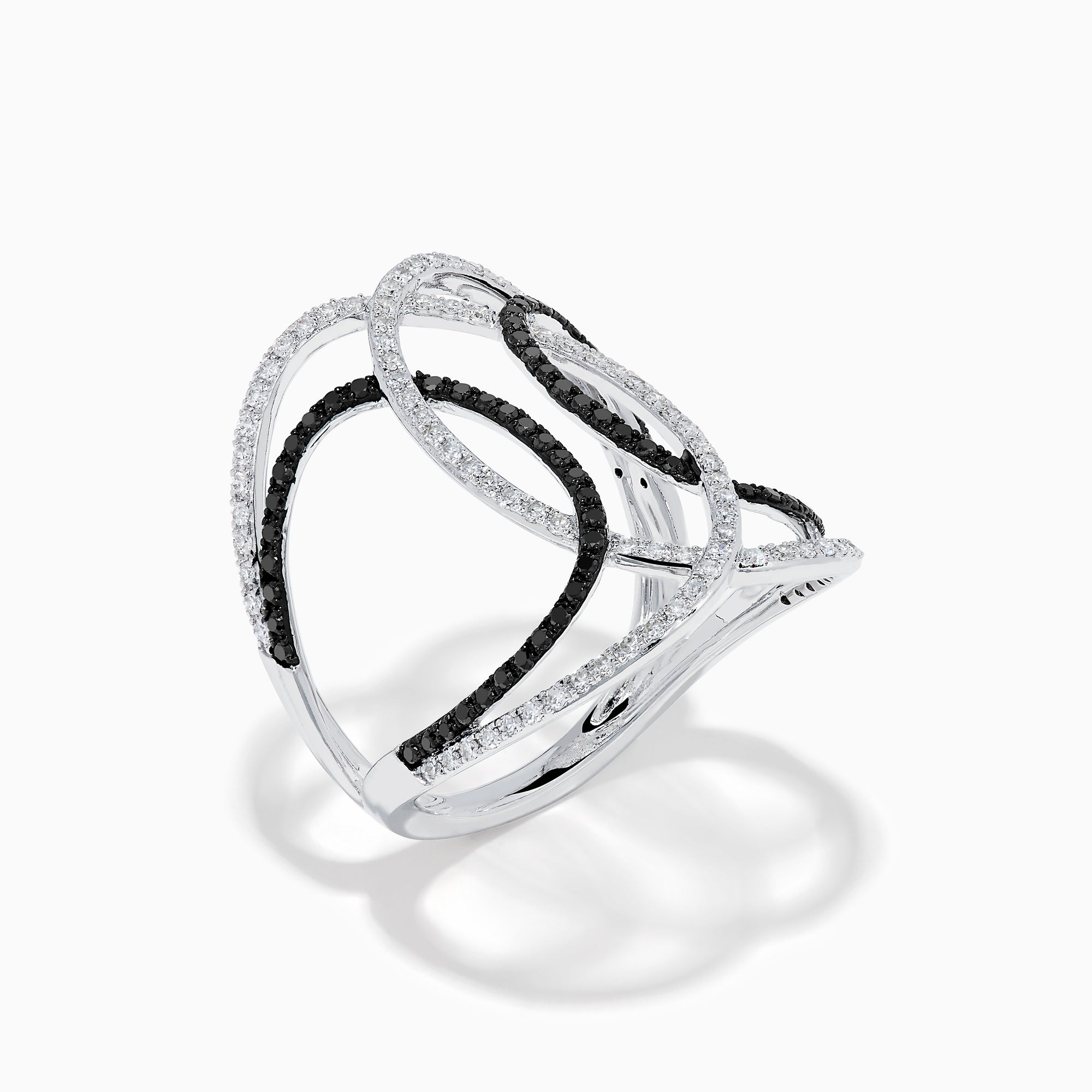 The 14K White Gold Black and White Diamond Intertwined Ring features interlocking ovals set with alternating rows of black and white diamonds, displayed on a plain white background.