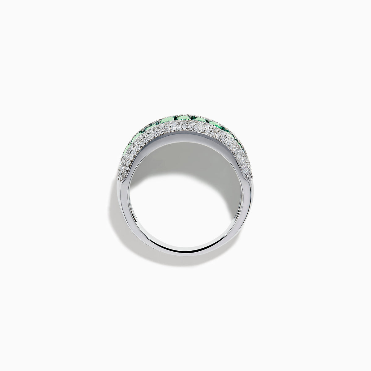 The 14K White Gold Emerald Baguette and Diamond Pavé Ring showcases a central row of emerald baguettes, flanked by rows of sparkling pavé diamonds on both sides.