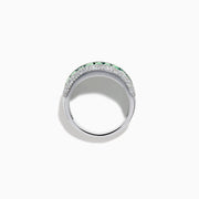 The 14K White Gold Emerald Baguette and Diamond Pavé Ring showcases a central row of emerald baguettes, flanked by rows of sparkling pavé diamonds on both sides.