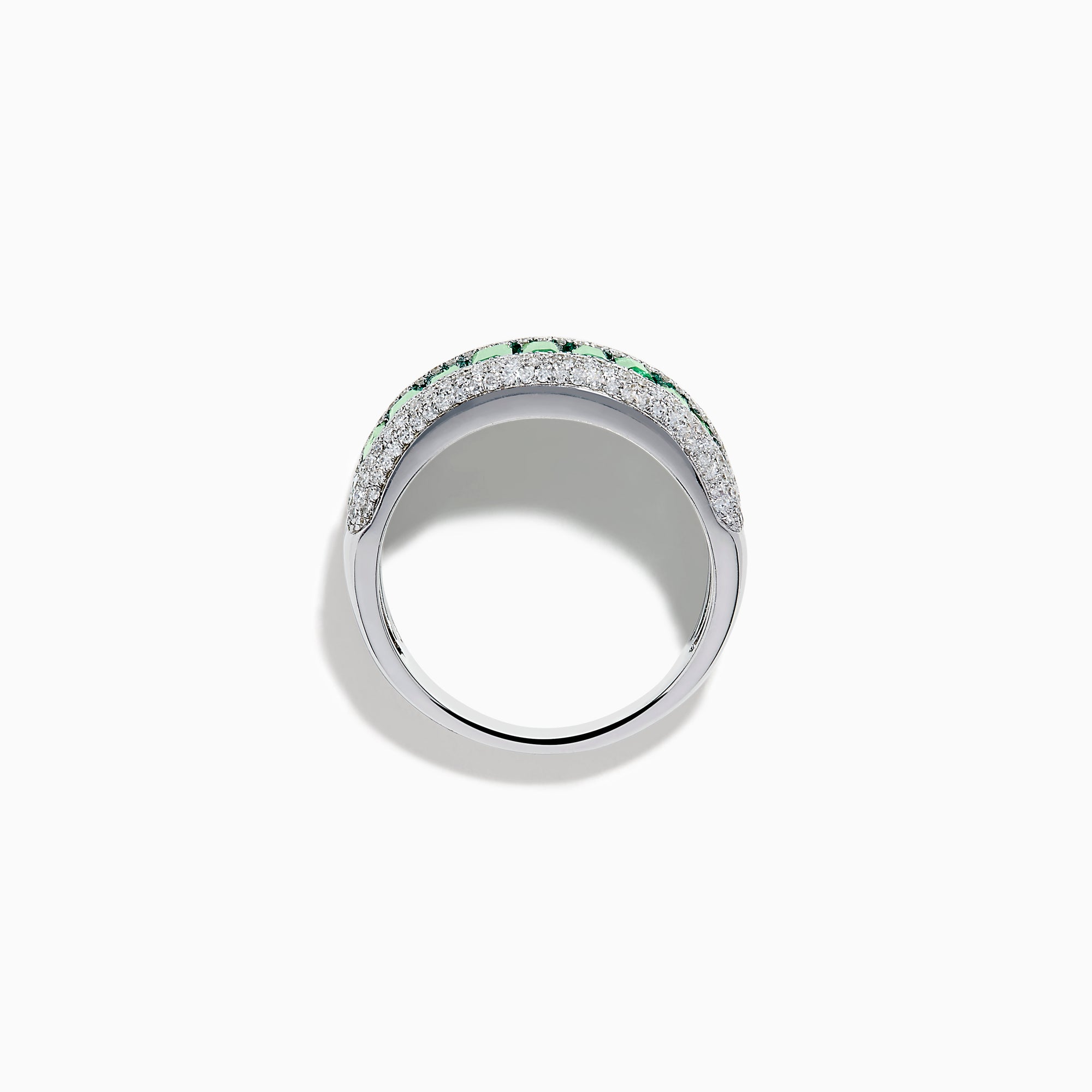 The 14K White Gold Emerald Baguette and Diamond Pavé Ring showcases a central row of emerald baguettes, flanked by rows of sparkling pavé diamonds on both sides.