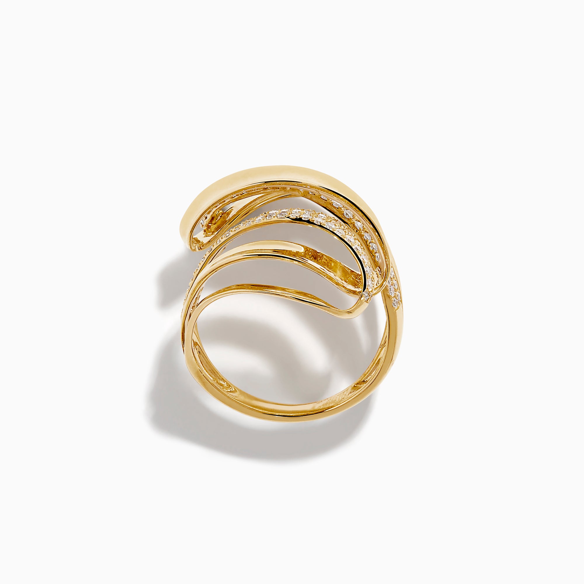 The 14K Yellow Gold Diamond Sculptural Ribbon Statement Ring features overlapping polished and diamond-encrusted bands, creating a dazzling, sculptural look.