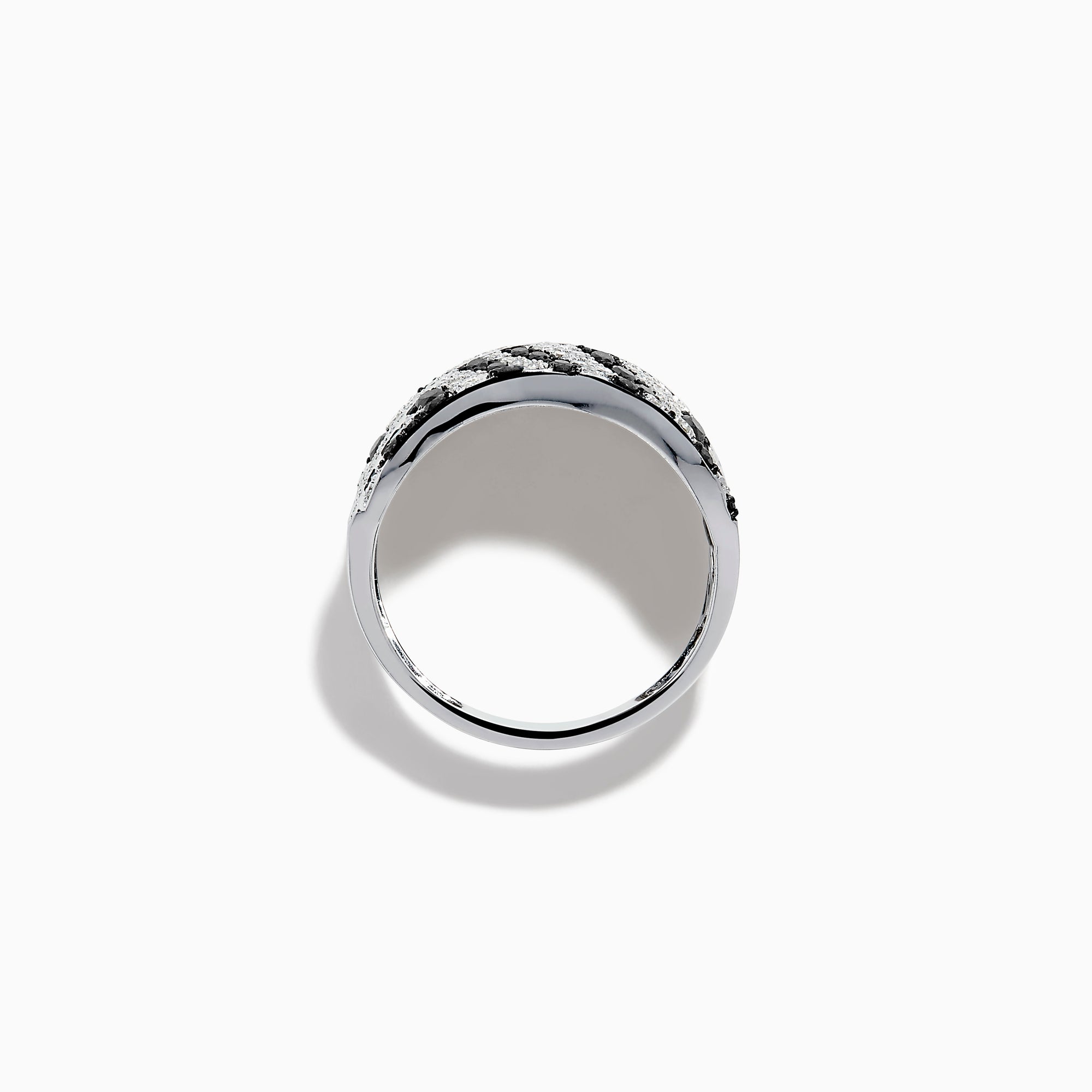 The 14K White Gold Black and White Diamond Zebra Print Ring features a wide, curved band with a striking black and white diamond stripe pattern set in sparkling white gold.