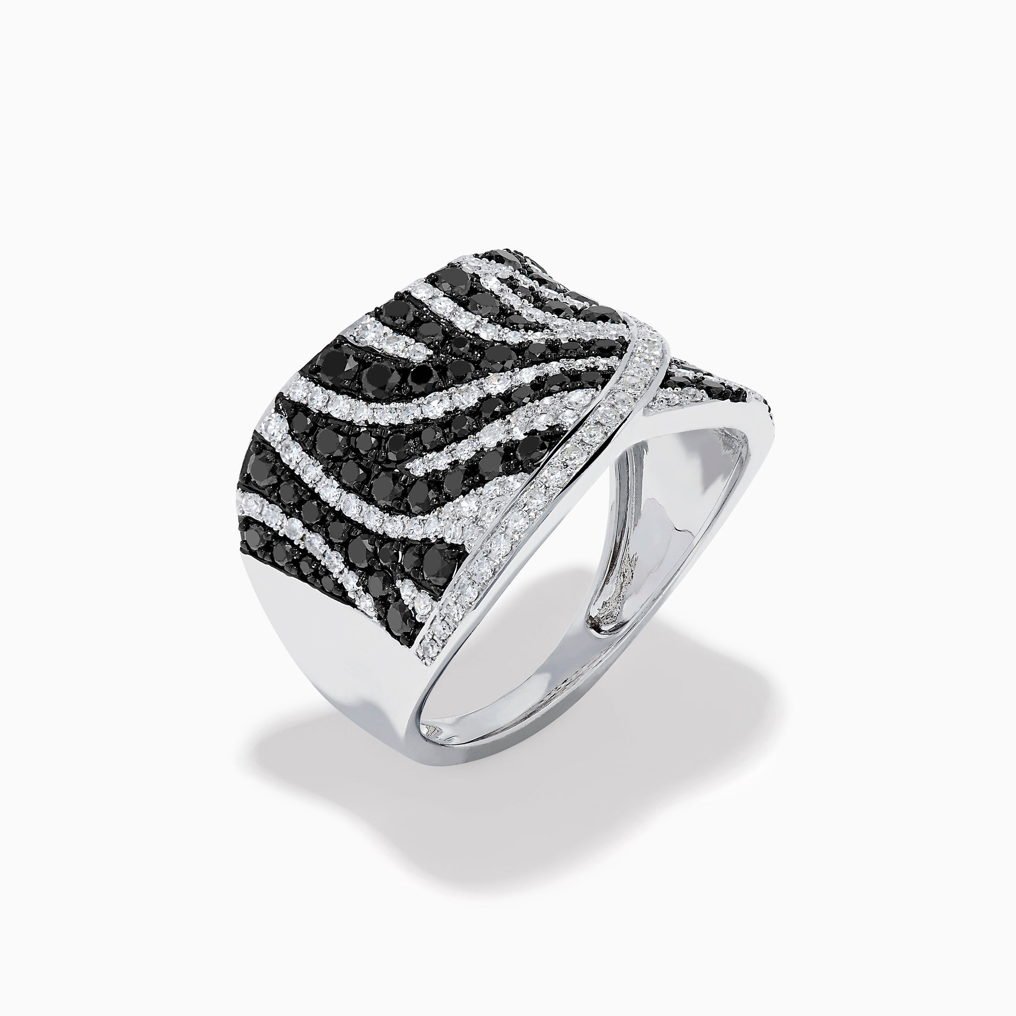 The 14K White Gold Black and White Diamond Zebra Print Ring features a wide, curved band with a striking black and white diamond stripe pattern set in sparkling white gold.